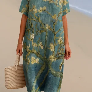 ALMONDE | Robe bleu-vert à imprimé fleuri