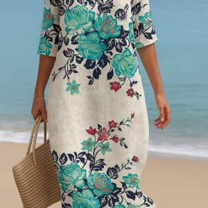 Élodie | Robe longue blanche à fleurs turquoises